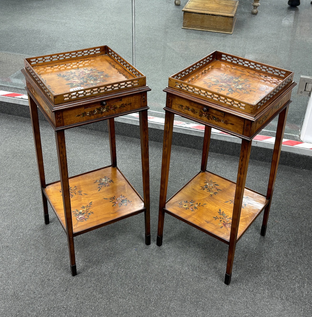 A pair of Sheraton Revival painted satinwood urn tables with pierced galleries, width 30cm, depth 30cm, height 70cm